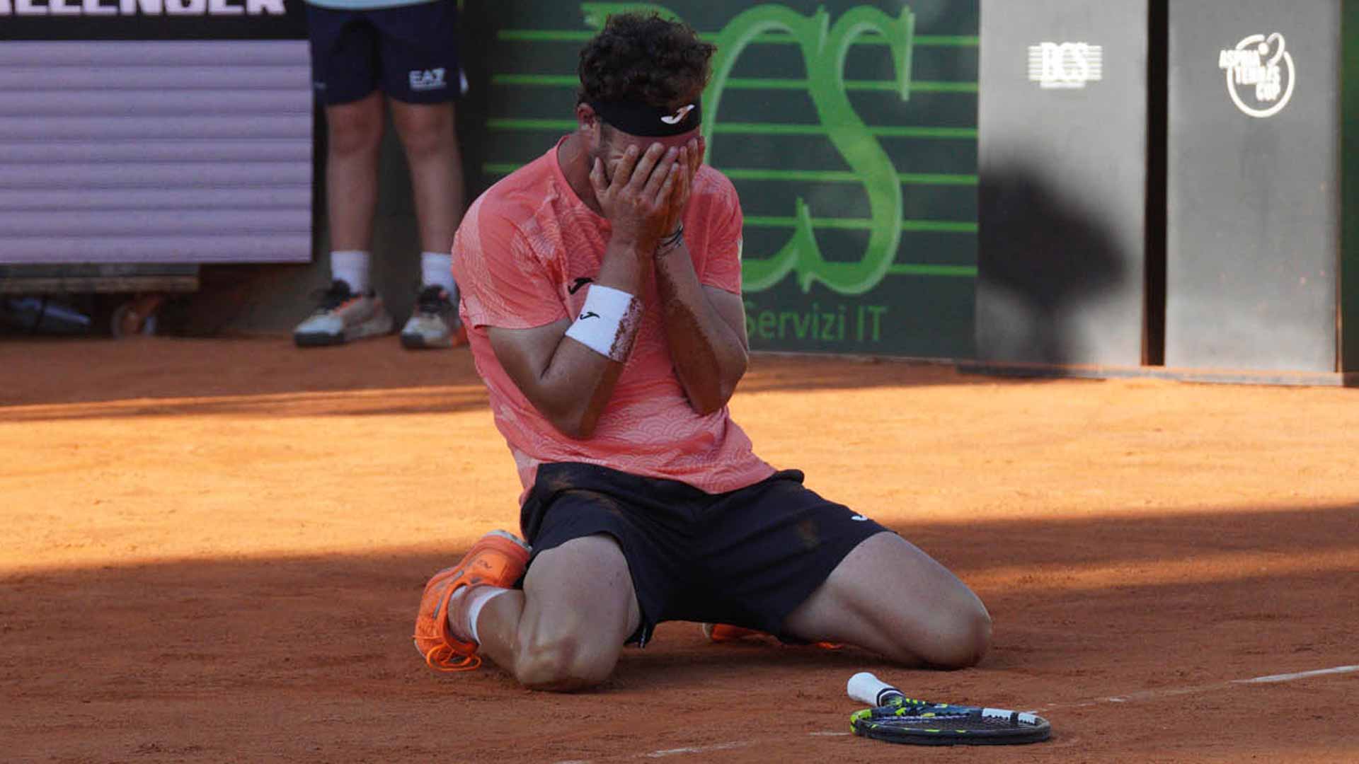 Marco Cecchinato celebrates winning the Milan Challenger.