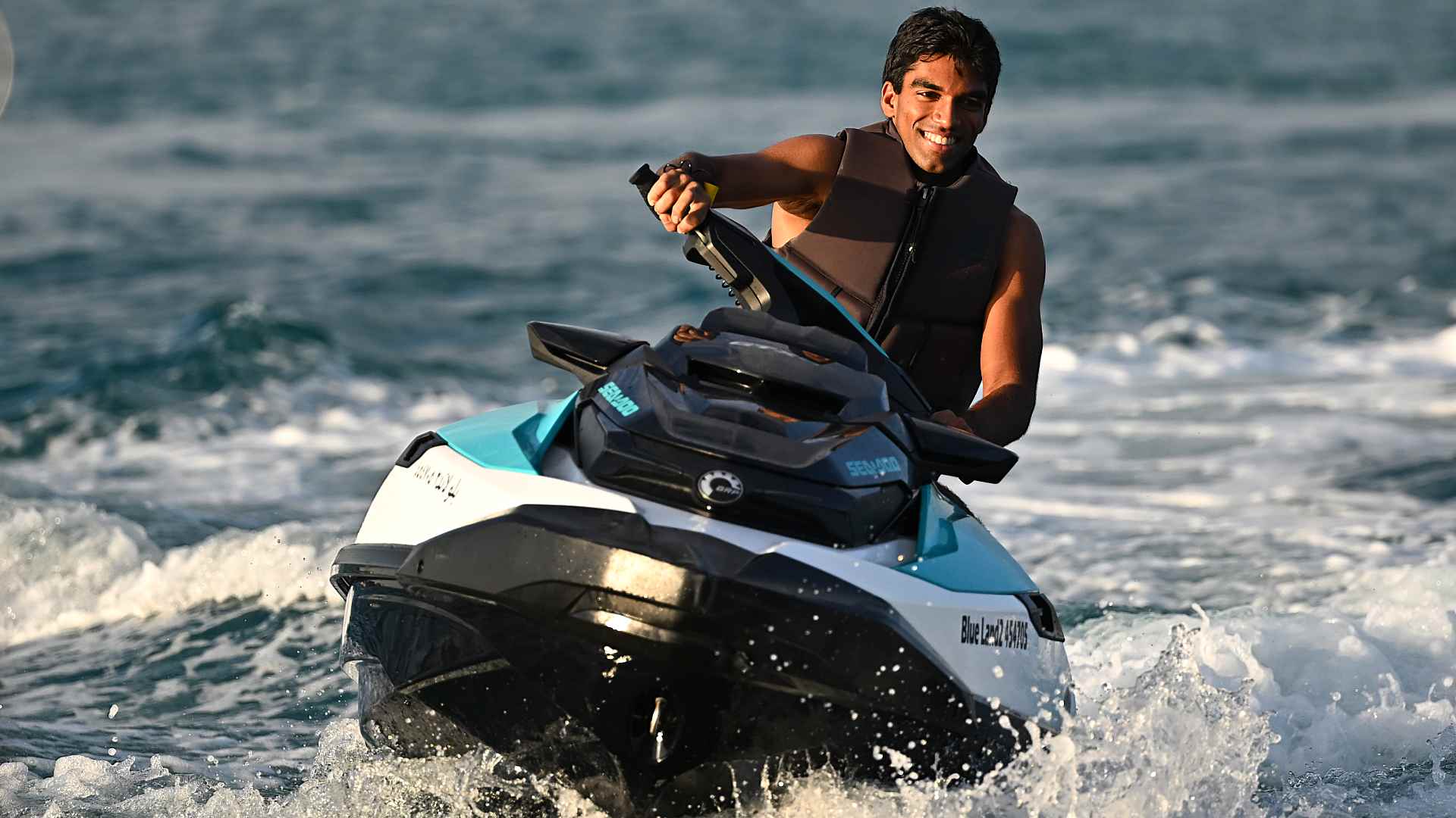 Nishesh Basavareddy on a jet ski ahead of the 2025 Next Gen ATP Finals presented by PIF. 