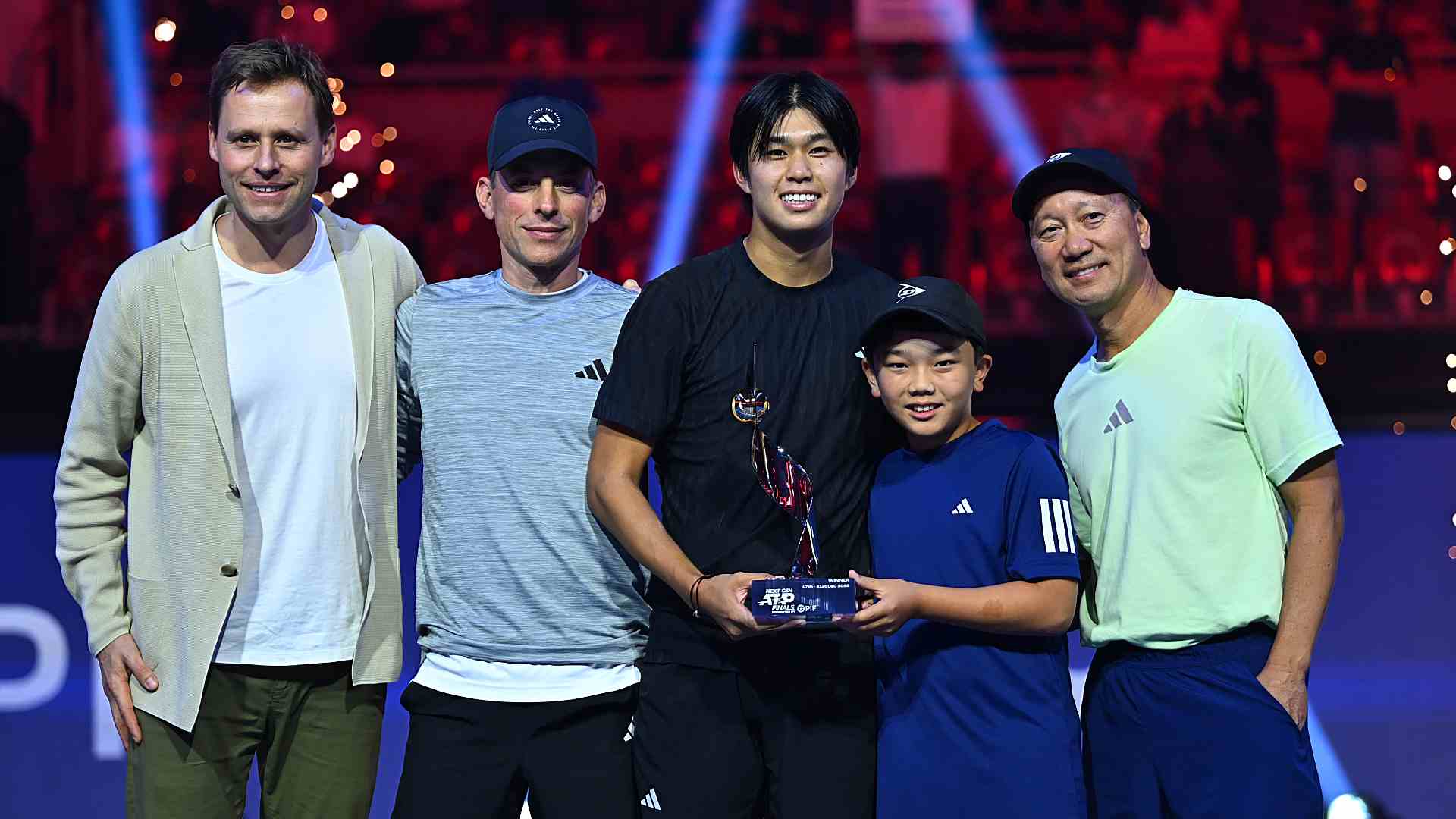Tien with agent Mats Merkel, coaches Erik Kortland and Michael Chang, and Chang’s son Micah.